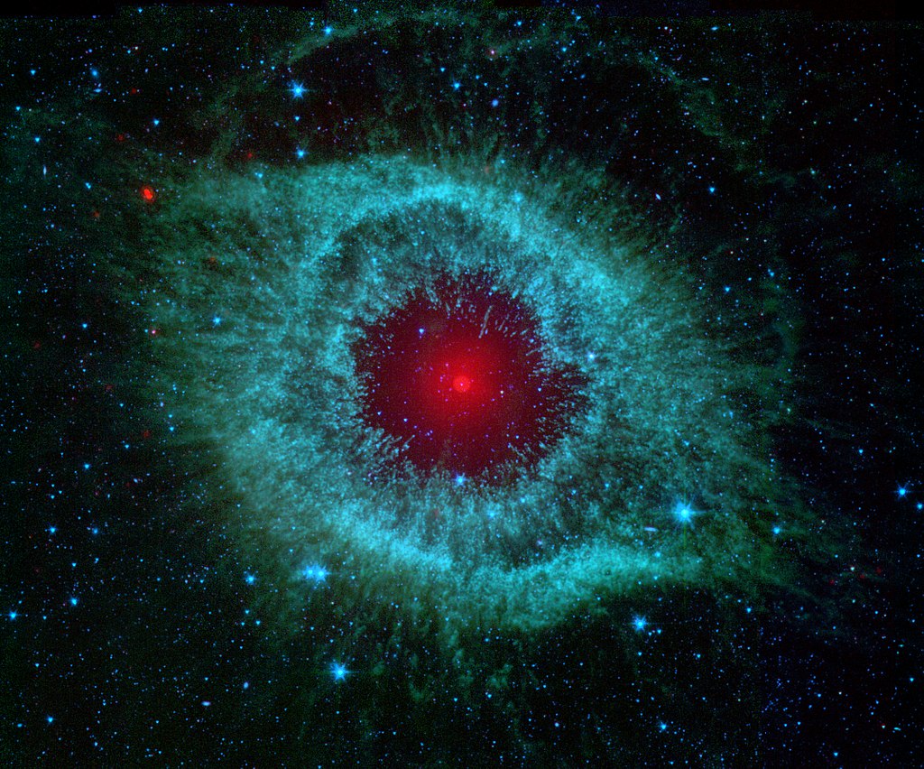 1024px-Comets_Kick_up_Dust_in_Helix_Nebula_(PIA09178).jpg